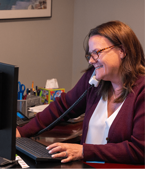 Jennifer Frioni talking with client